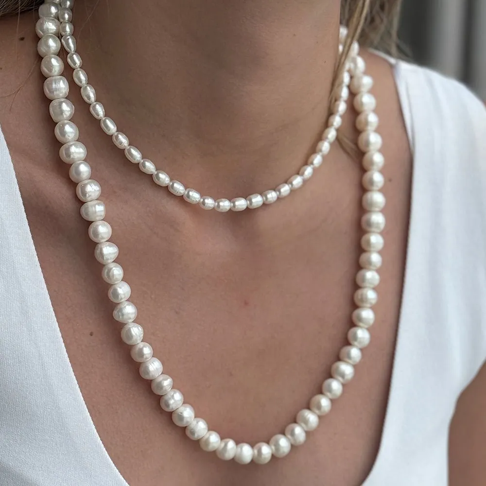 LONG PEARL STRAND NECKLACE